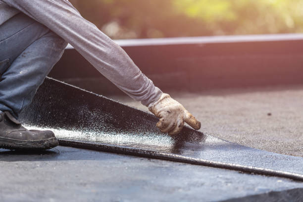 Professional Emergency Waterproofing technician working in Hillsborough, NC